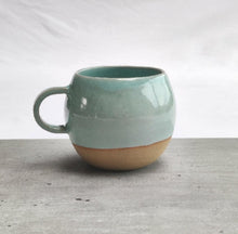 Load image into Gallery viewer, Celadon turquoise round cup, tea cup, coffee cup. Unglazed base.