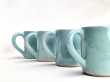 Load image into Gallery viewer, Espresso coffee cups - mini mugs set of four. Handmade stoneware ceramic celadon pale jade green glaze. Also made to order