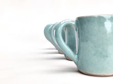 Load image into Gallery viewer, Espresso coffee cup mini mug handmade stoneware ceramic celadon pale jade green glaze. Also made to order