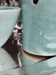 Handmade stoneware ceramic lidded jar celadon pale jade glaze