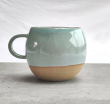 Load image into Gallery viewer, Celadon turquoise round cup, tea cup, coffee cup. Unglazed base.